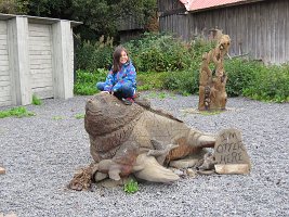 IMG 8300  Megan on a sea lion wood carving, Seldovia, AK