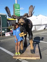 IMG 8782  Stewie the wood carved Moose with Megan, Anchorage Market Festival, Anchorage, AK