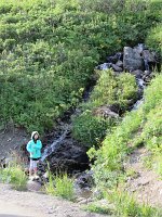 IMG 5694  Megan with roadside waterfall along Hatcher Pass Rd, Hatcher Pass, AK