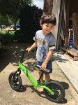 IMG_3881 Modelling his balance bike, so we could sell it, now that he no longer needs it.