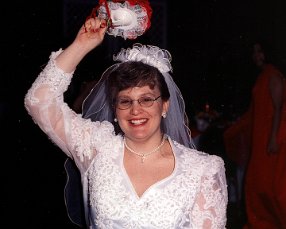 206L Source Photo Julie-o-Lantern IV - Throwing the bridal bouquet from our Wedding