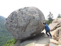 IMG 4779  Julie pushing South Bubble Rock, Acadia National Park