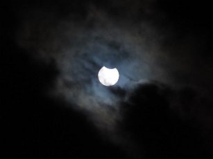 IMG_7012 Partial Eclipse through the clouds, The Witte Museum, San Antonio, TX